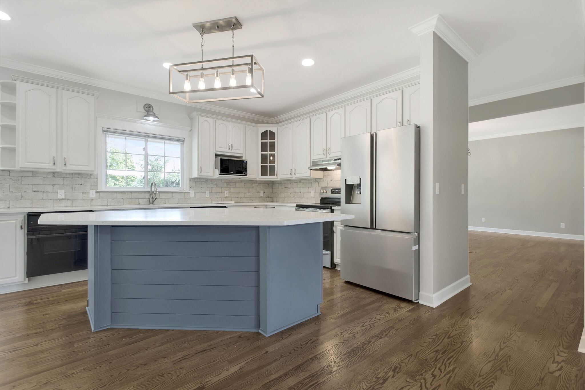 1576 Old Hillsboro Road Franklin, TN 37069 - Photo 14 of 66 a kitchen with a refrigerator stove and white cabinets