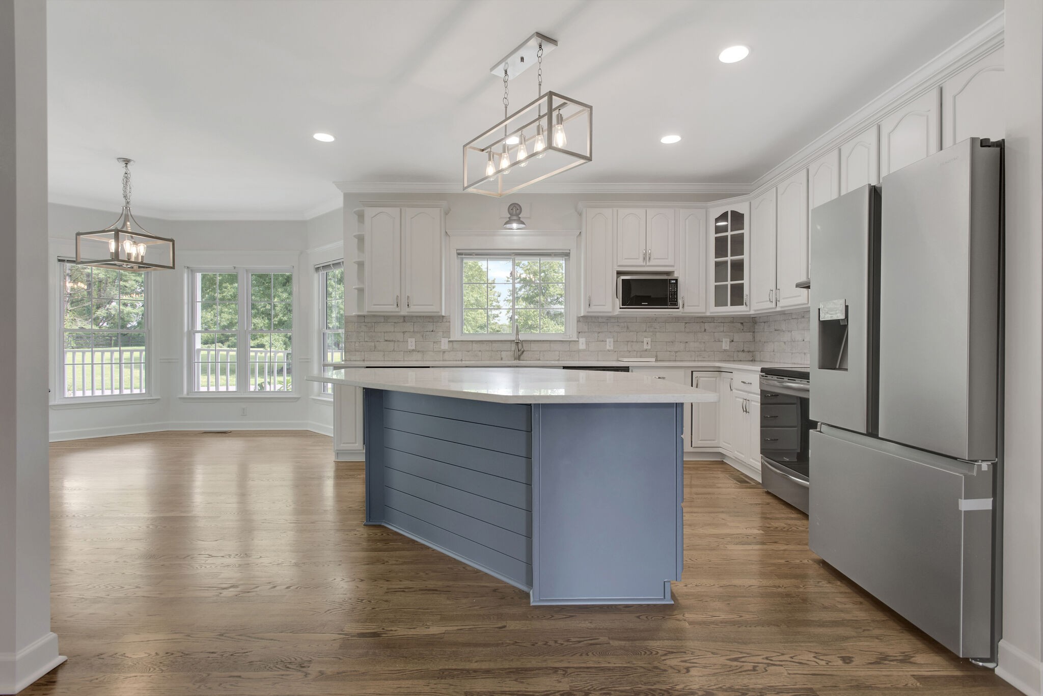 1576 Old Hillsboro Road Franklin, TN 37069 - Photo 15 of 66 a large kitchen with granite countertop a large counter top space appliances and cabinets