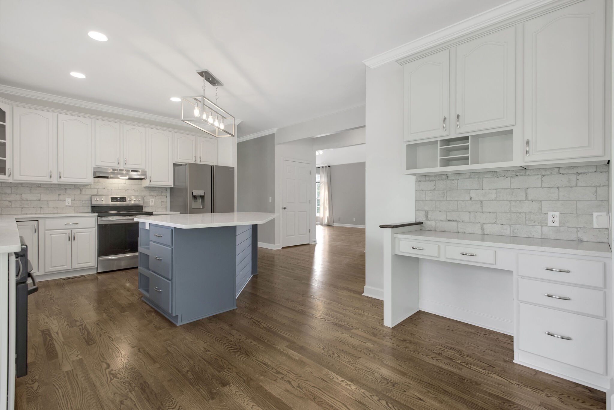 1576 Old Hillsboro Road Franklin, TN 37069 - Photo 19 of 66 a kitchen with stainless steel appliances granite countertop a white cabinets a sink a stove a refrigerator and white cabinets