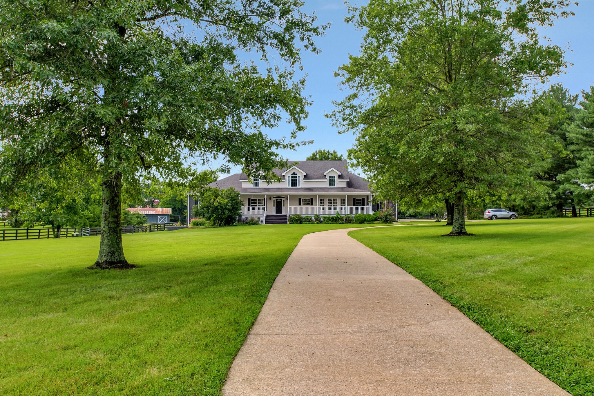 1576 Old Hillsboro Road Franklin, TN 37069 - Photo 2 of 66 a view of a house with a yard