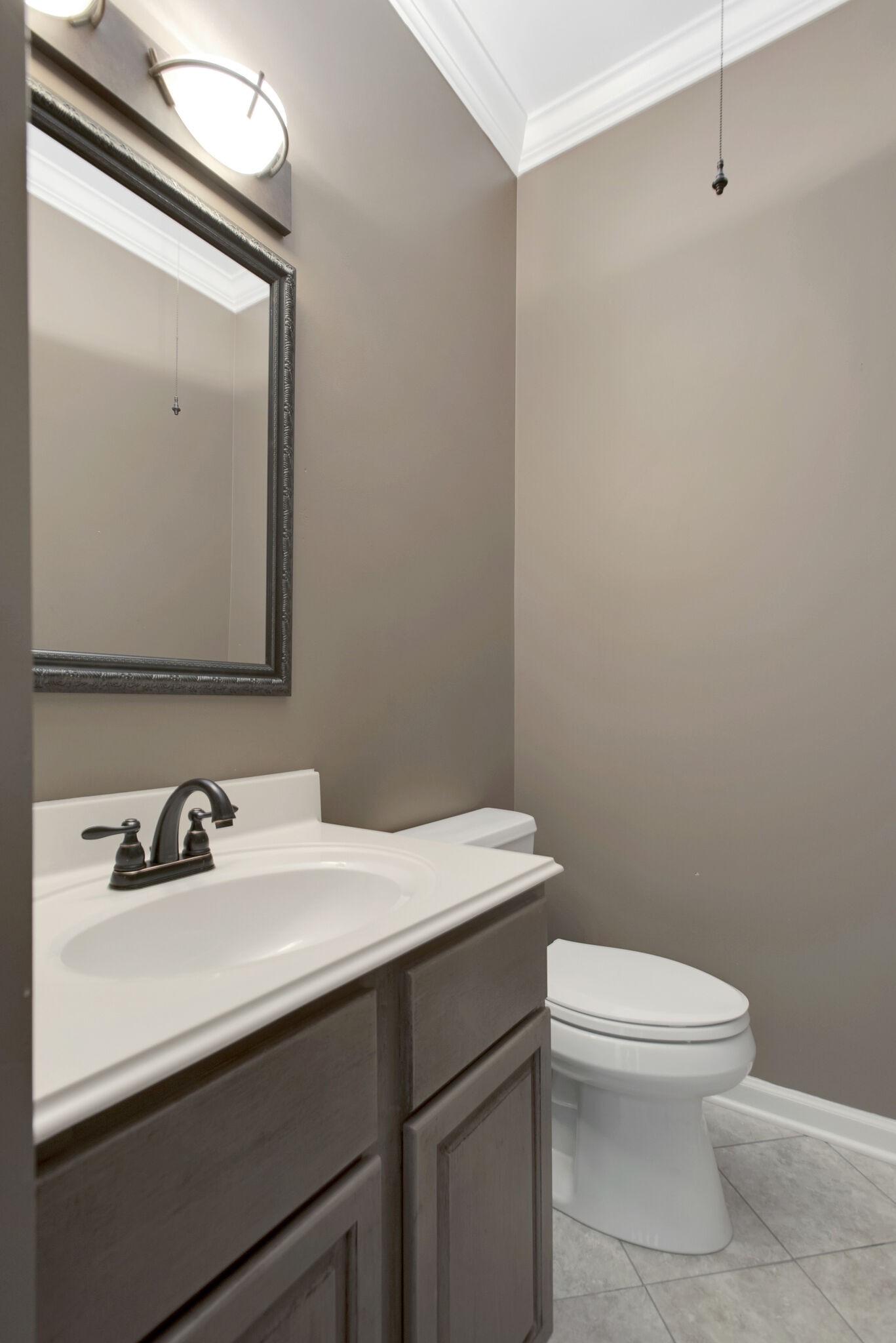 1576 Old Hillsboro Road Franklin, TN 37069 - Photo 25 of 66 a bathroom with a sink a toilet and mirror