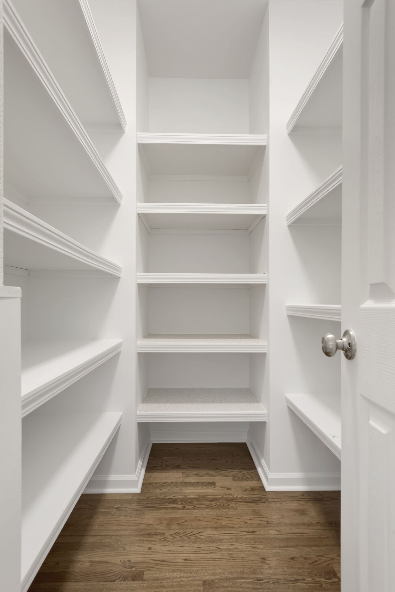 1576 Old Hillsboro Road Franklin, TN 37069 - Photo 26 of 66 a view of walk in closet with empty racks