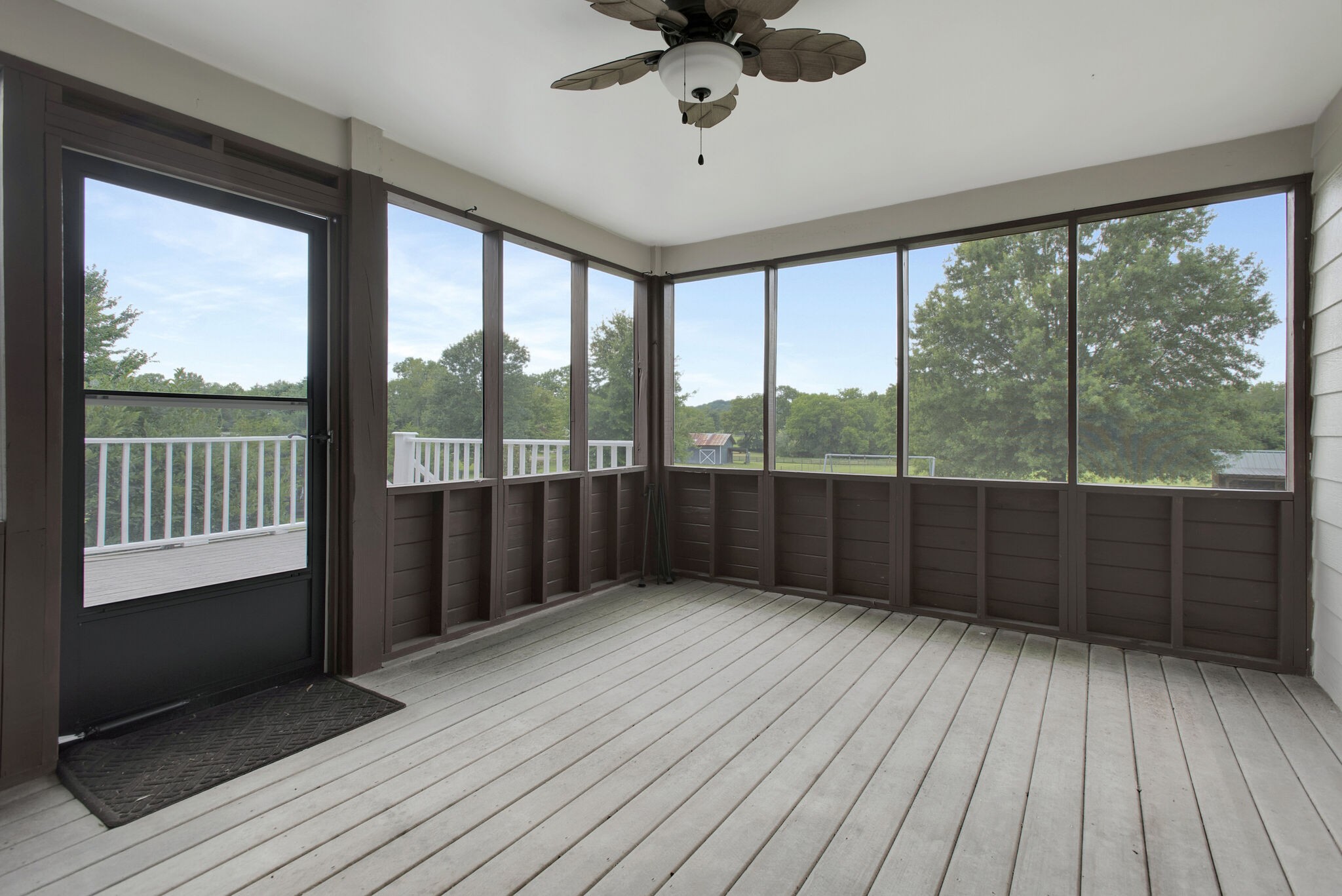 1576 Old Hillsboro Road Franklin, TN 37069 - Photo 27 of 66 a view of a room with wooden floor and balcony