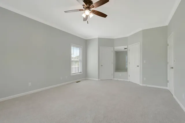 a bathroom with a double vanity sink and mirror