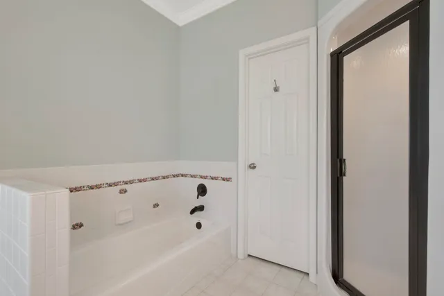 an empty room with a empty space and windows