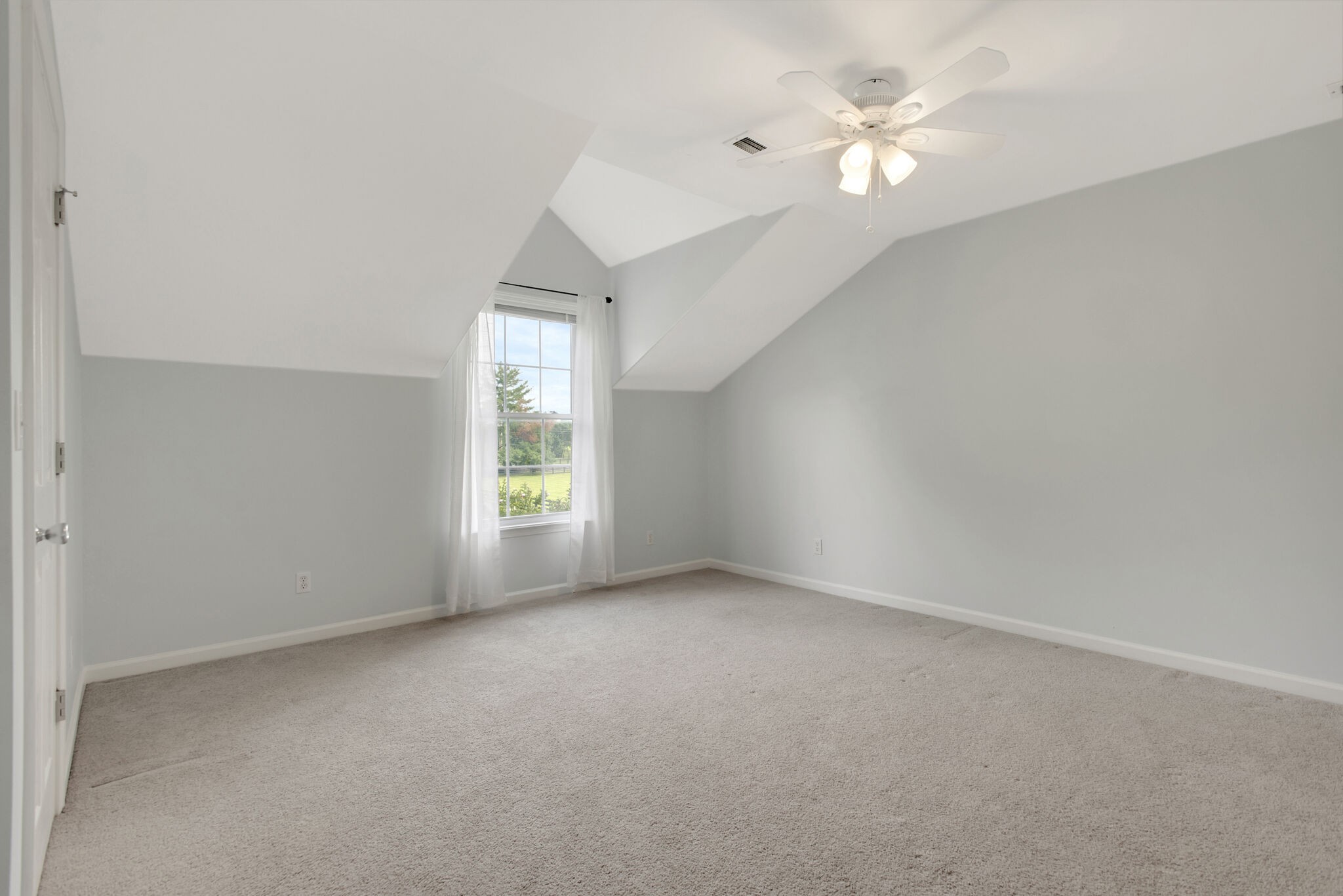 1576 Old Hillsboro Road Franklin, TN 37069 - Photo 40 of 66 an empty room with windows and fan