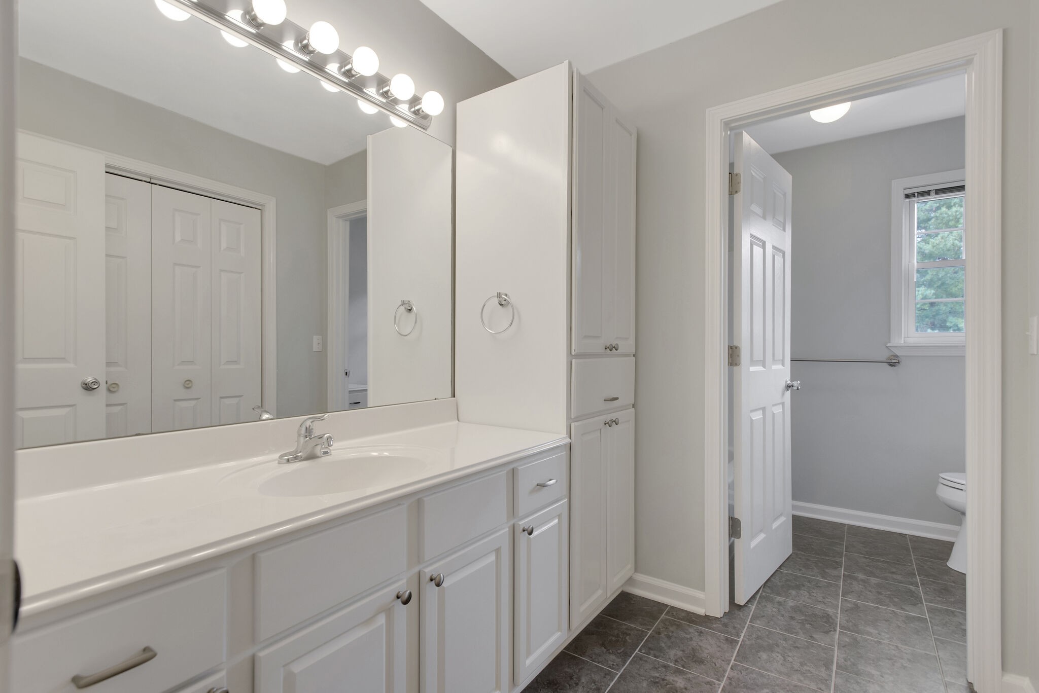 1576 Old Hillsboro Road Franklin, TN 37069 - Photo 42 of 66 a bathroom with a double vanity sink and mirror