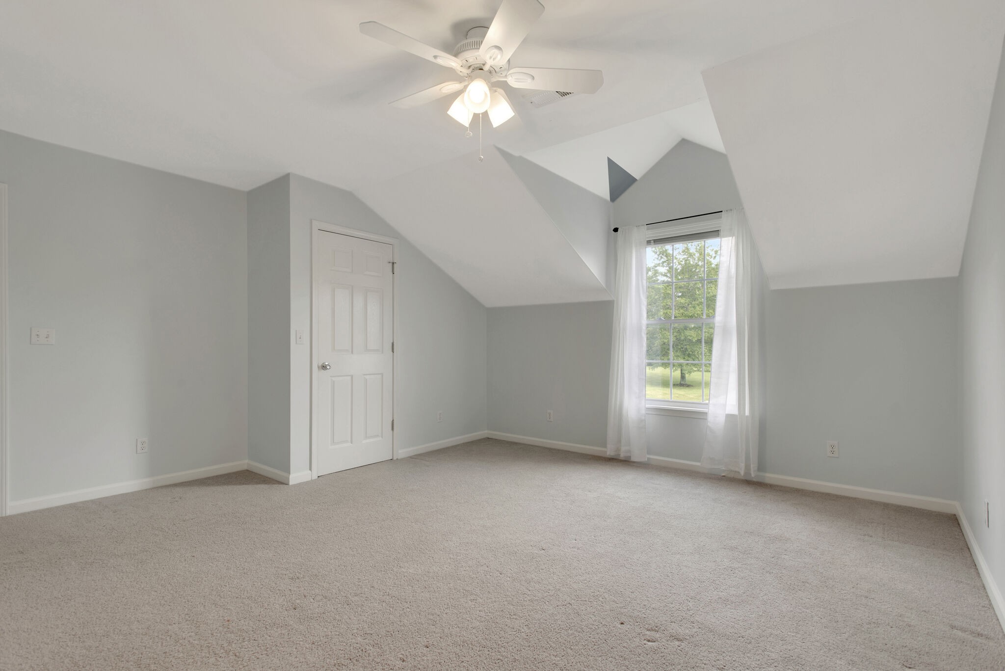 1576 Old Hillsboro Road Franklin, TN 37069 - Photo 43 of 66 an empty room with windows and fan