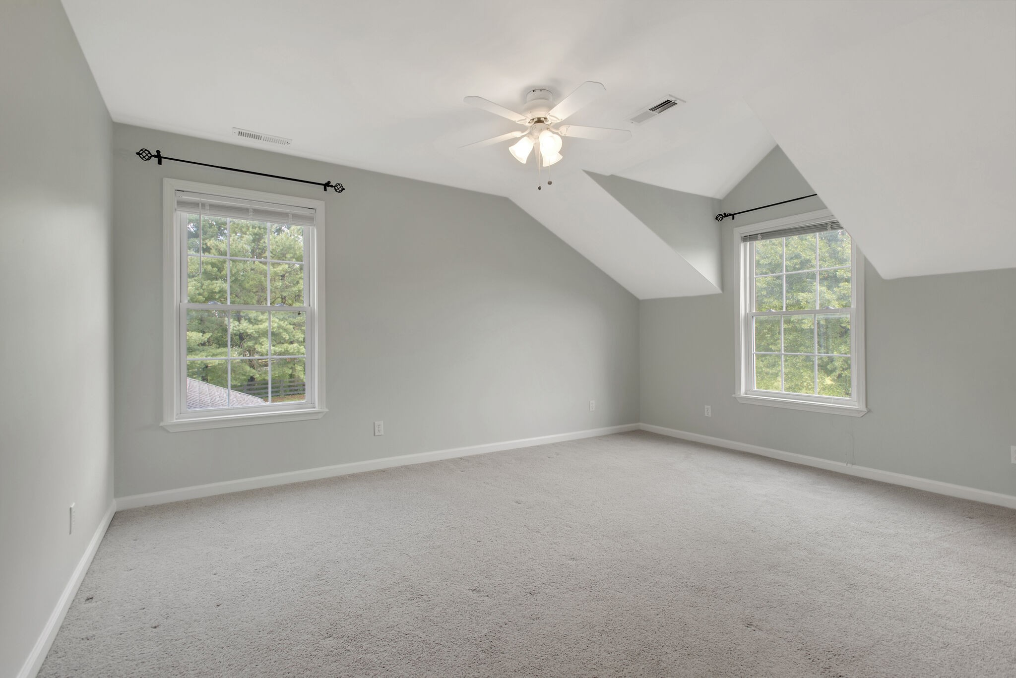 1576 Old Hillsboro Road Franklin, TN 37069 - Photo 44 of 66 an empty room with a window and a chandelier fan