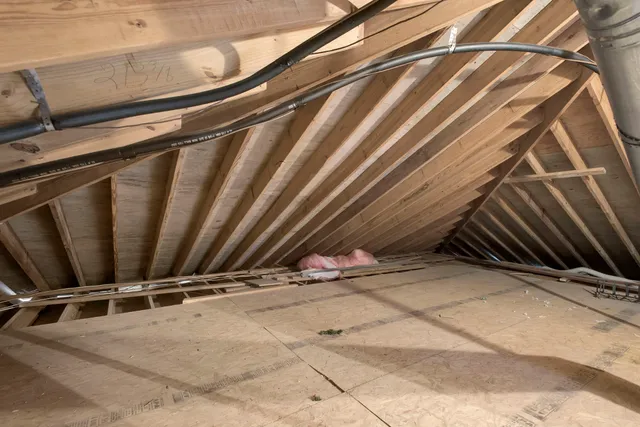 a view of a house with a yard and a garden