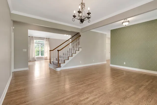 a view of livingroom with window hardwood floor and ceiling window