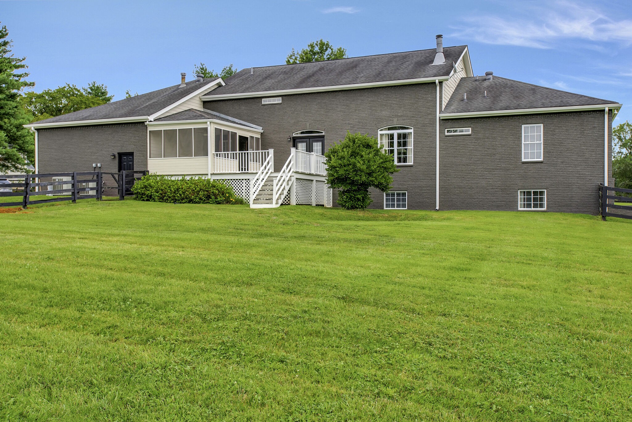 1576 Old Hillsboro Road Franklin, TN 37069 - Photo 60 of 66 a front view of a house with a yard