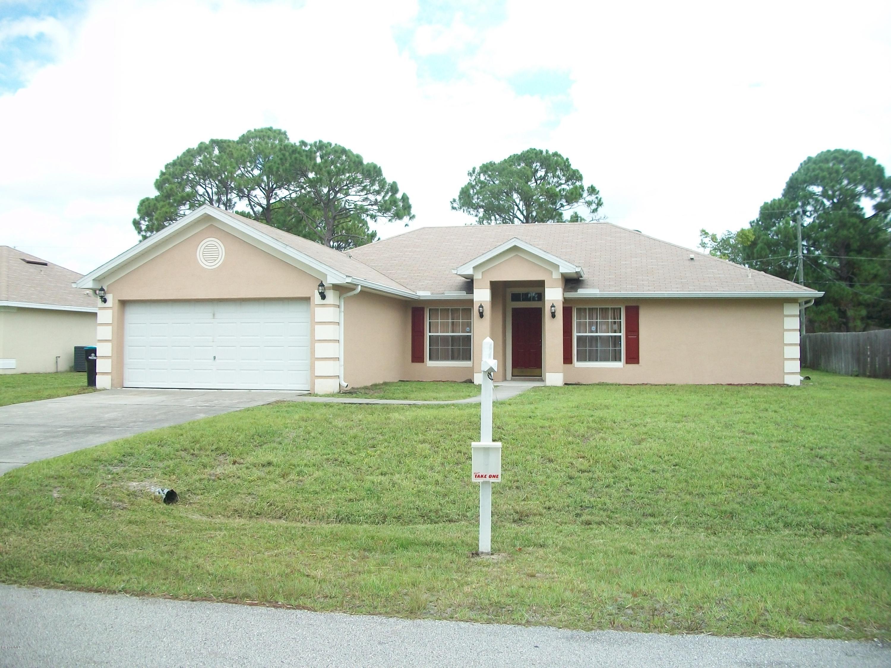 497 Australian Road Northwest Palm Bay, FL 32907 - Photo 1 of 14 Front of House