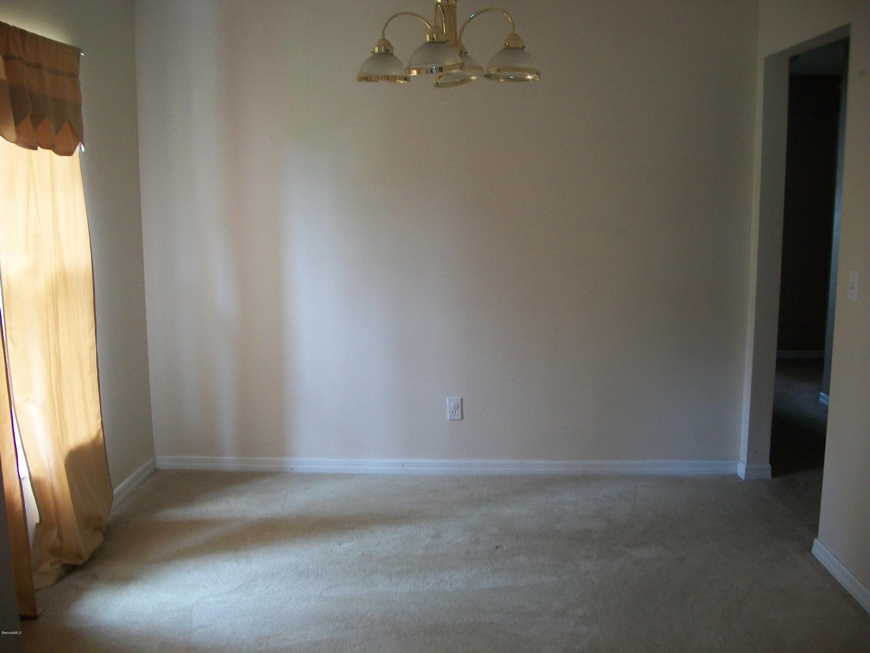 497 Australian Road Northwest Palm Bay, FL 32907 - Photo 3 of 14 Formal Dining Room