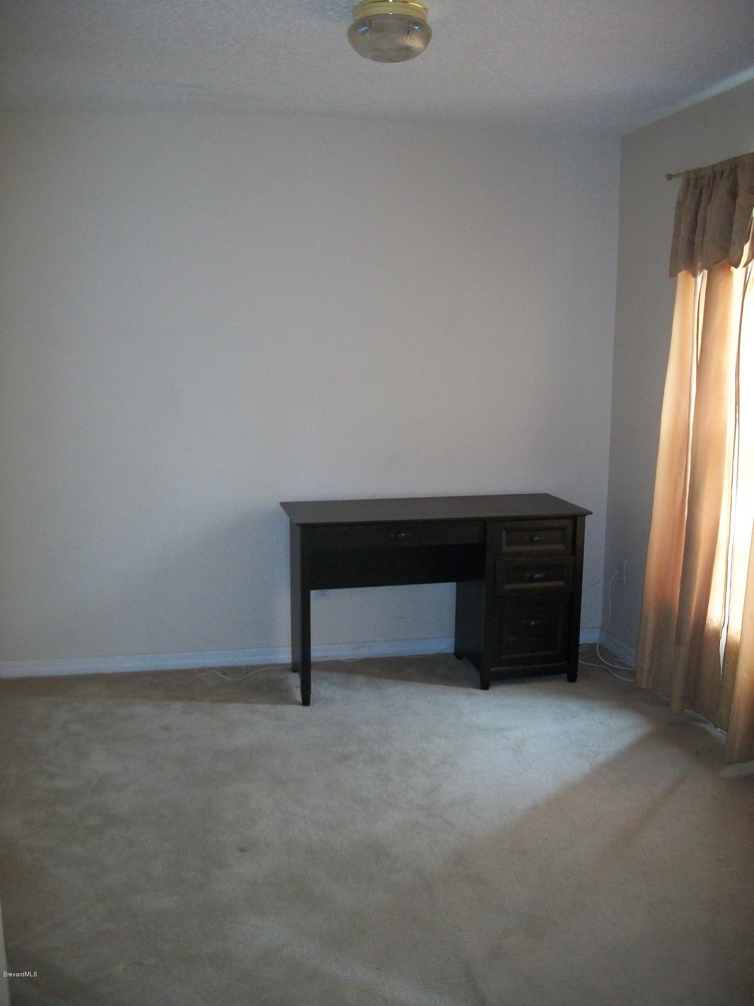 497 Australian Road Northwest Palm Bay, FL 32907 - Photo 4 of 14 Formal Living Room