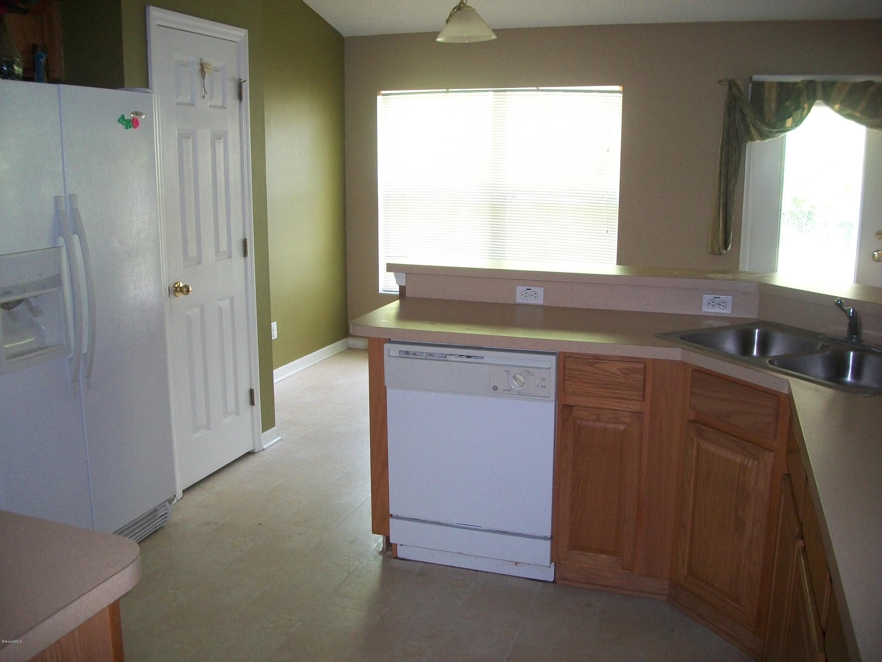 497 Australian Road Northwest Palm Bay, FL 32907 - Photo 6 of 14 Kitchen