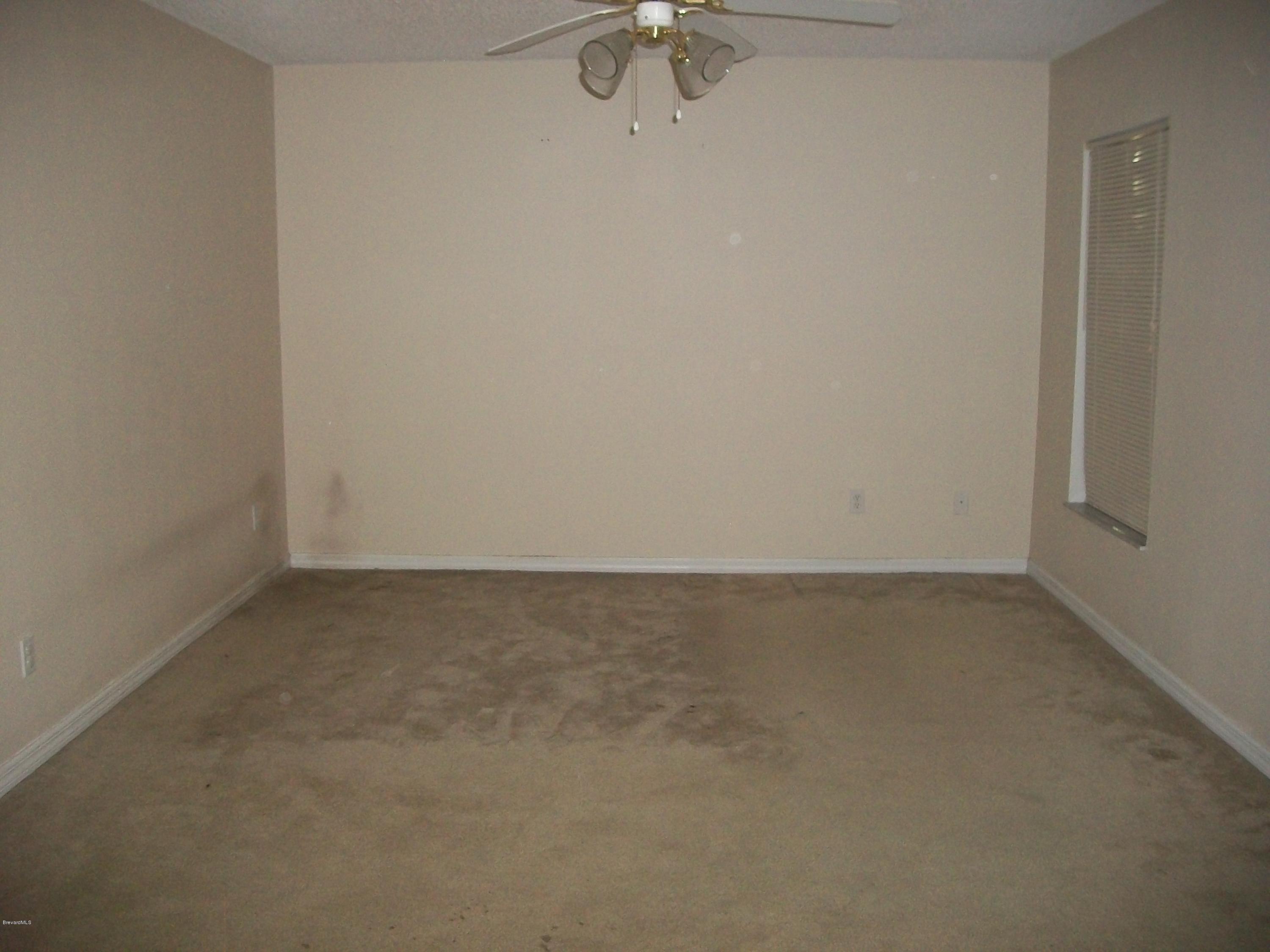 497 Australian Road Northwest Palm Bay, FL 32907 - Photo 8 of 14 Master Suite