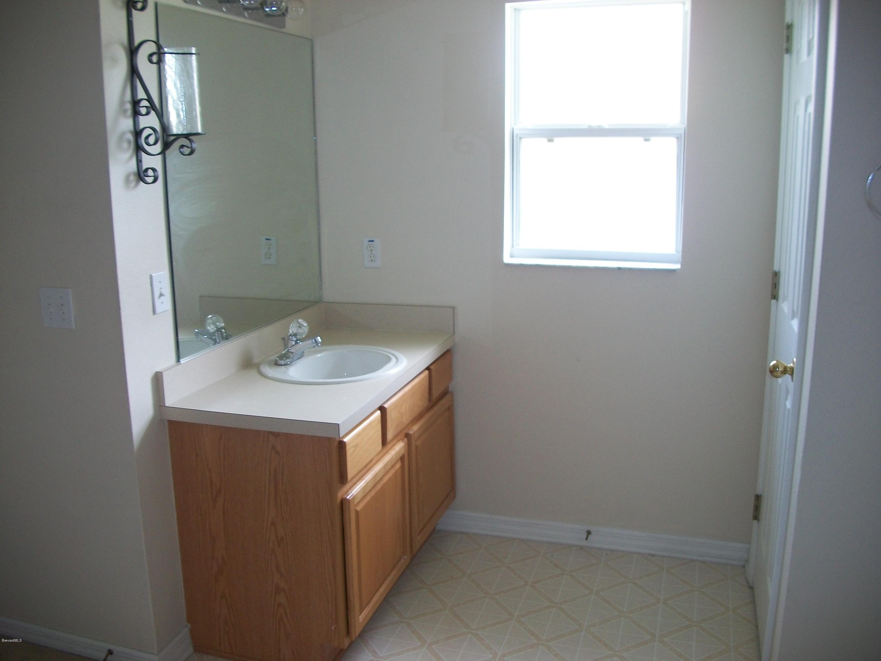 497 Australian Road Northwest Palm Bay, FL 32907 - Photo 10 of 14 Master Suite Bathroom