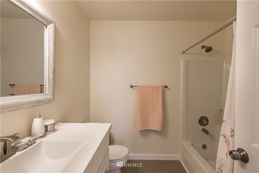 4425 180th Way Southwest Rochester, WA 98579 - Photo 14 of 25 a bathroom with a sink toilet and shower