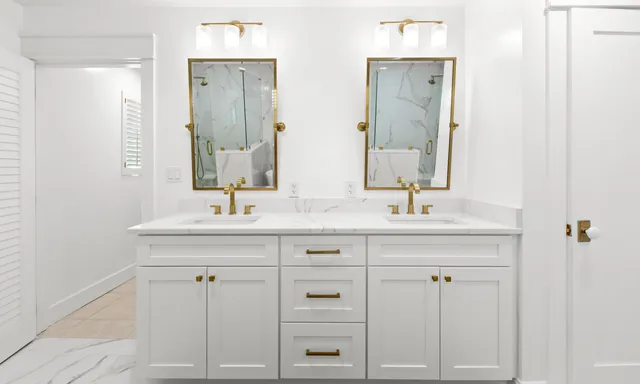 a view of a building with sitting area and furniture