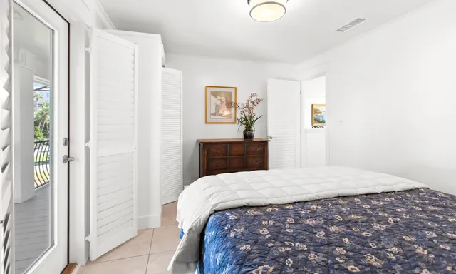 a view of a house with swimming pool and sitting area