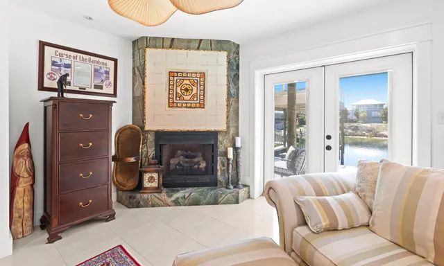 a view of living room kitchen and entryway