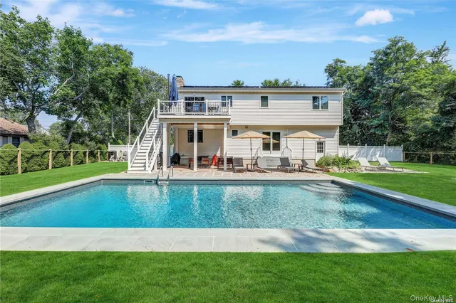 a view of a house with a swimming pool