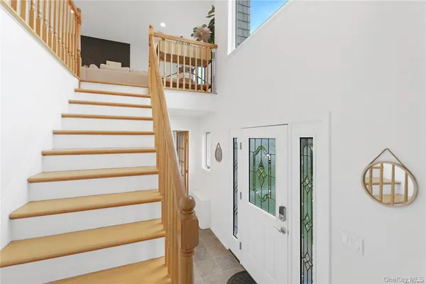 a view of entryway with a front door