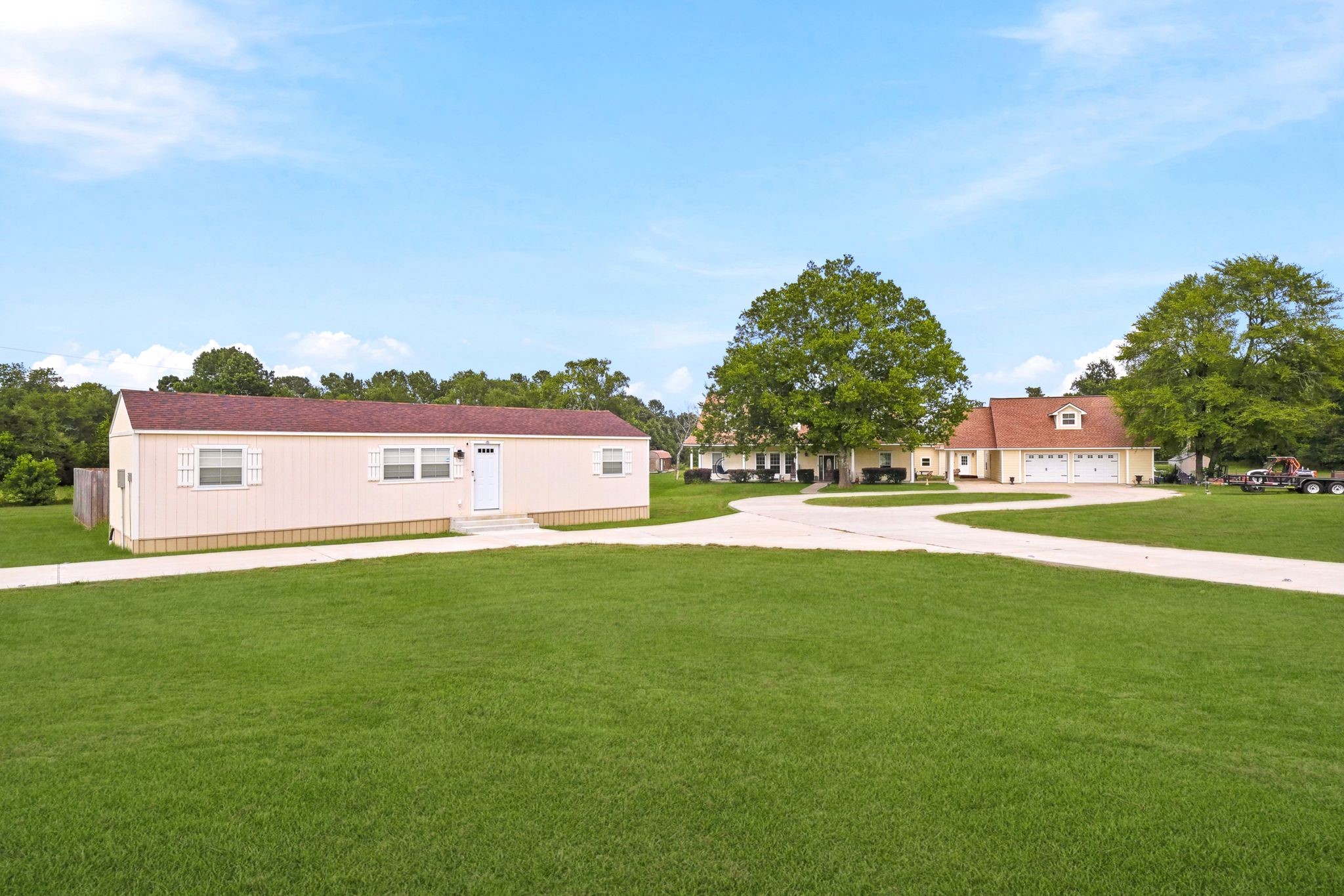 144 Wood Farm Road Huntsville, TX 77320 - Photo 50 of 50 a view of a house with a yard