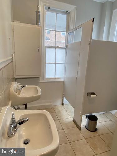 218 East Market Street York, PA 17403 - Photo 11 of 11 a bathroom with a sink and a tub