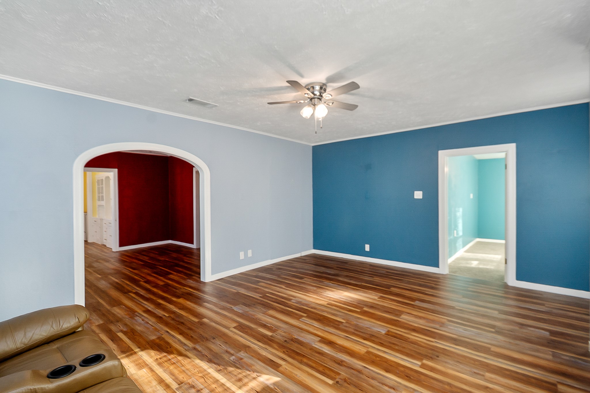 109 Maple Street Highlands, TX 77562 - Photo 12 of 50 a view of empty room with wooden floor