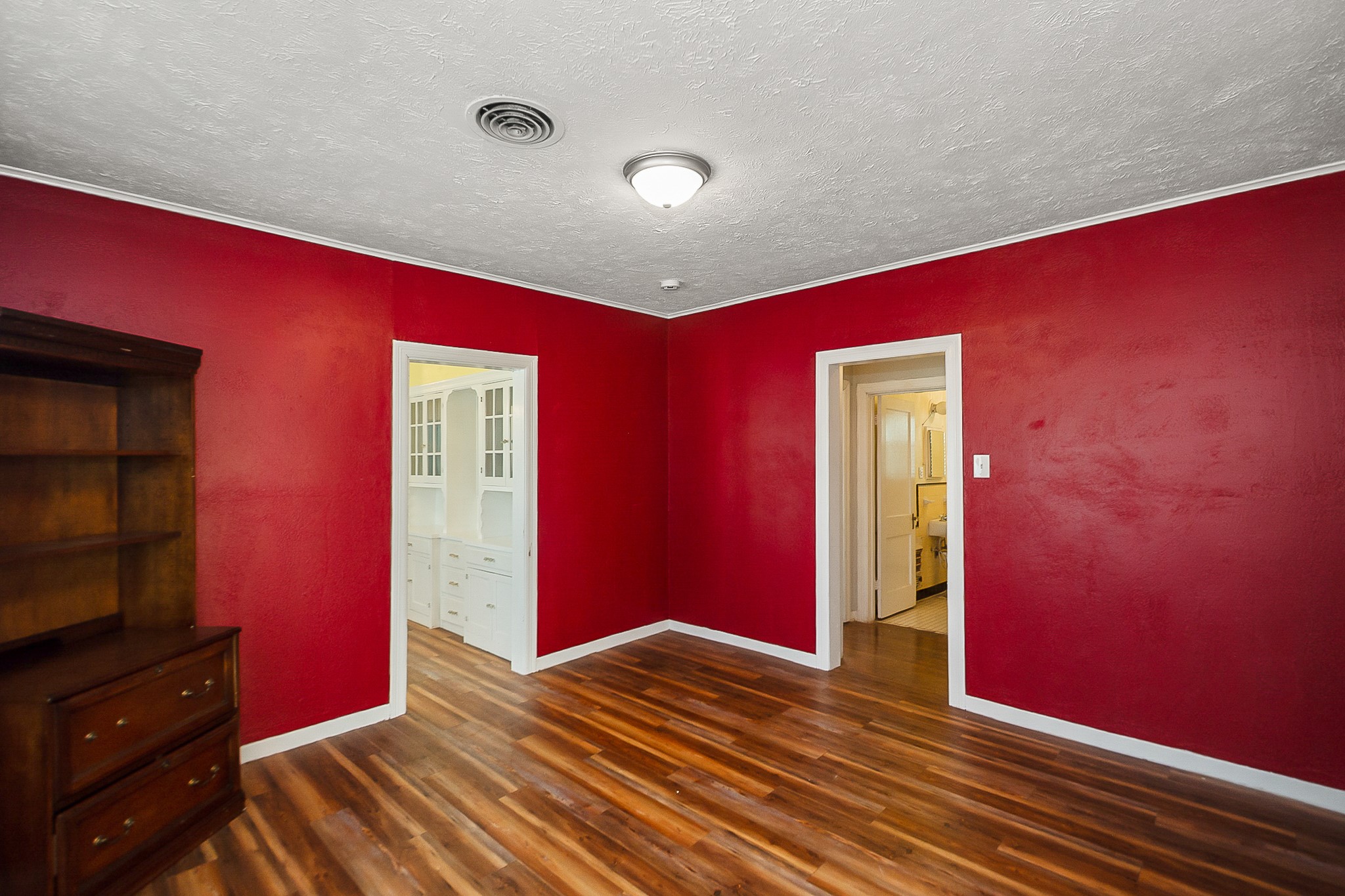 109 Maple Street Highlands, TX 77562 - Photo 16 of 50 a view of a livingroom with wooden floor and flat screen tv