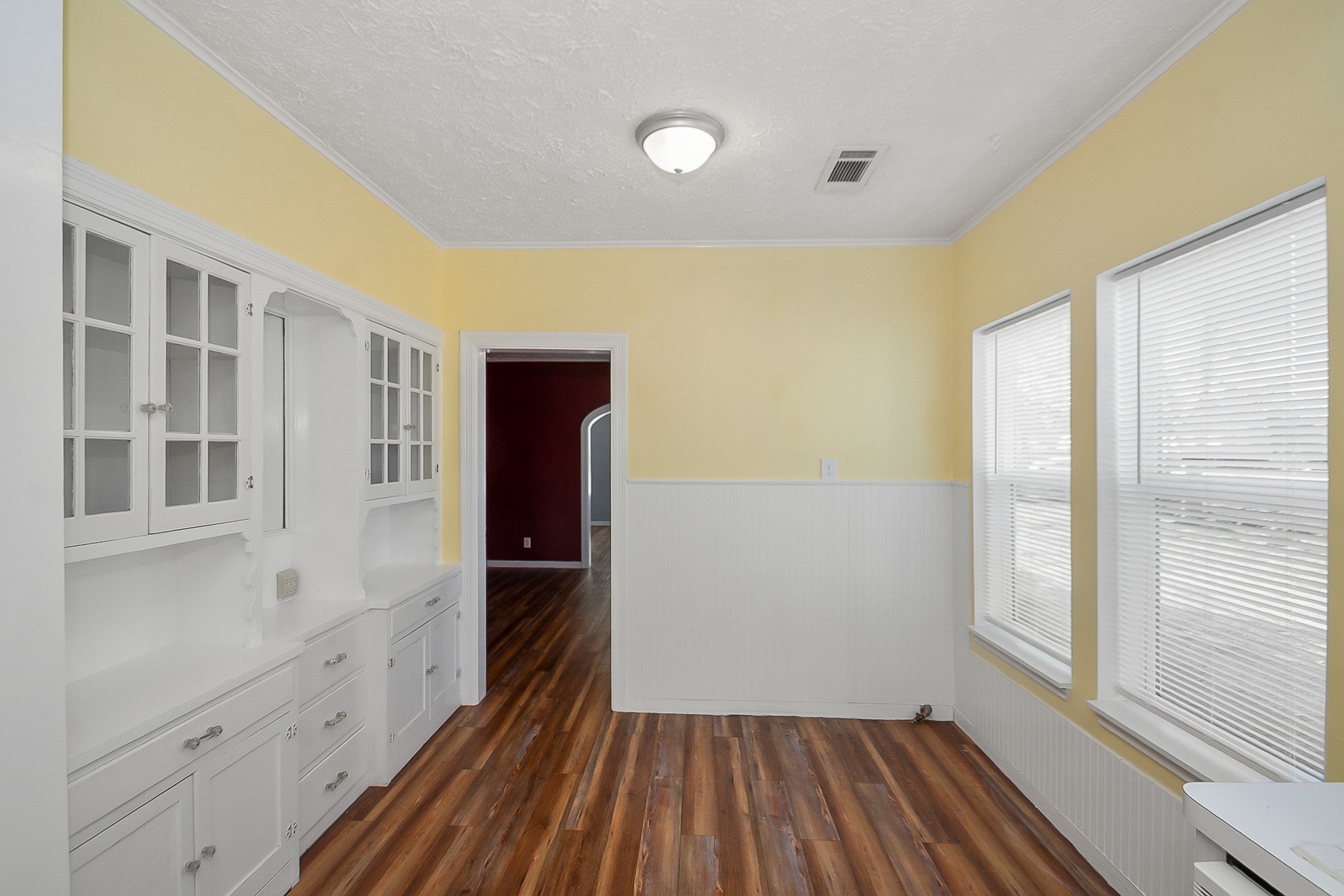 109 Maple Street Highlands, TX 77562 - Photo 22 of 50 a view of a room with wooden floor and windows