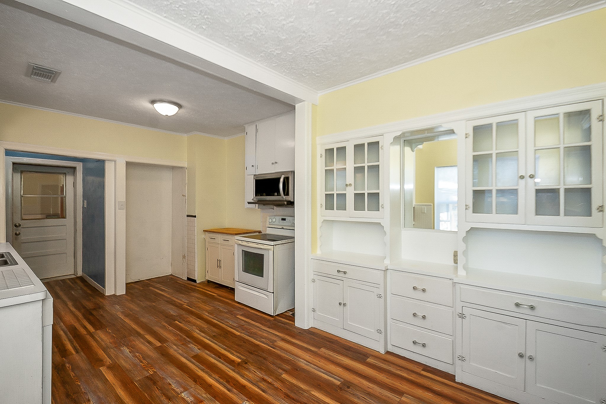 109 Maple Street Highlands, TX 77562 - Photo 24 of 50 a kitchen with a stove oven and sink