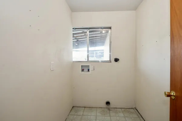 a view of a small space with window in it