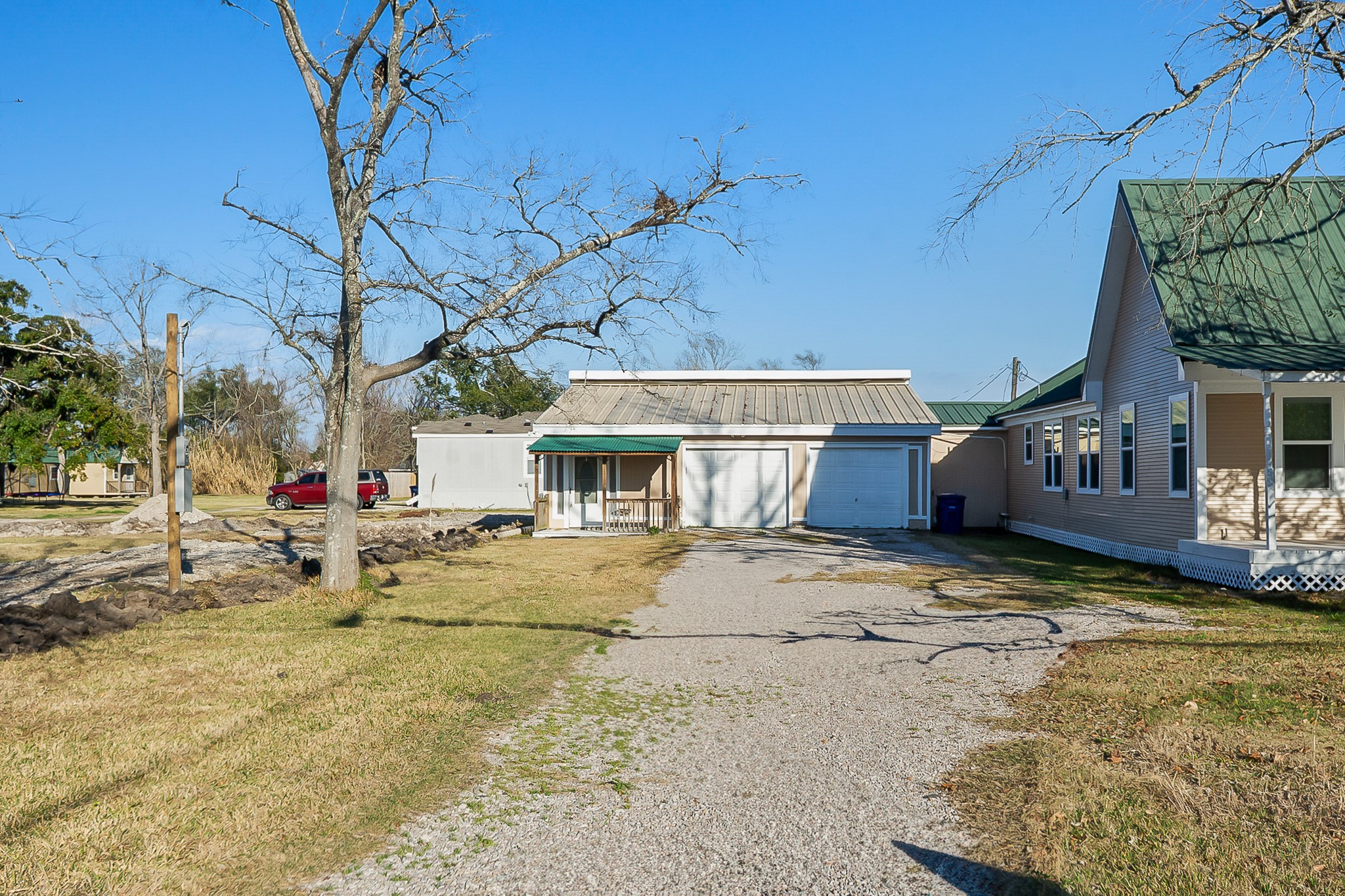 109 Maple Street Highlands, TX 77562 - Photo 4 of 50 a view of a house with snow on the road
