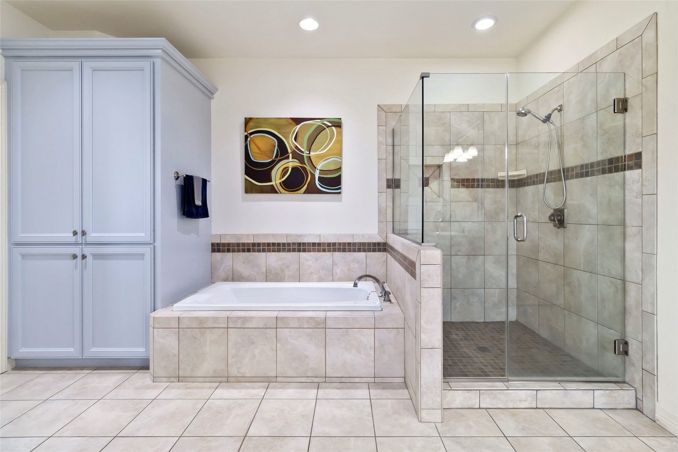 633 Flaman Road Canyon Lake, TX 78133 - Photo 17 of 40 a bathroom with a shower