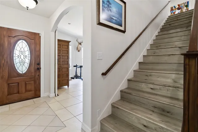 a view of entryway with wooden floor