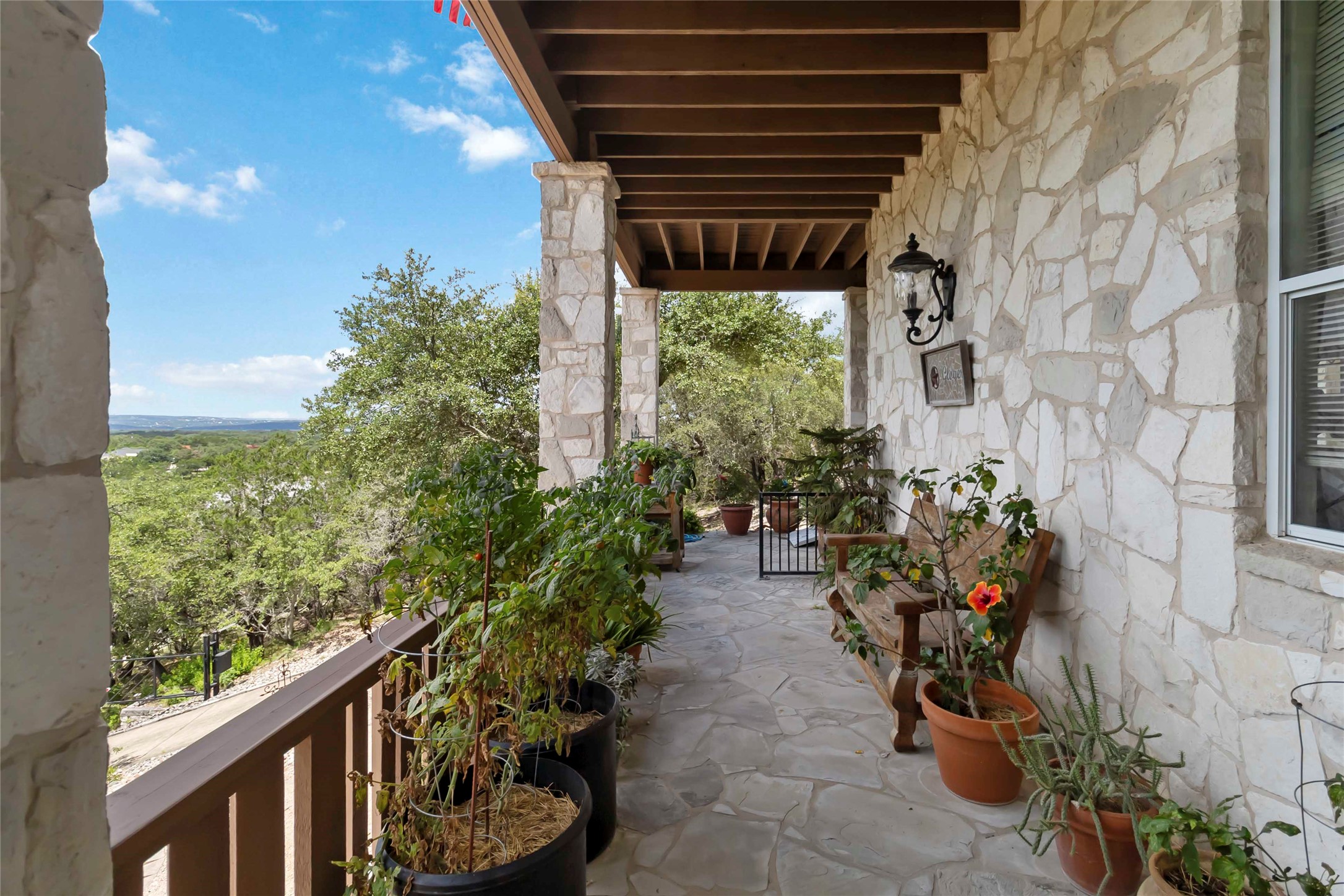 633 Flaman Road Canyon Lake, TX 78133 - Photo 34 of 40 a view of a backyard with potted plants