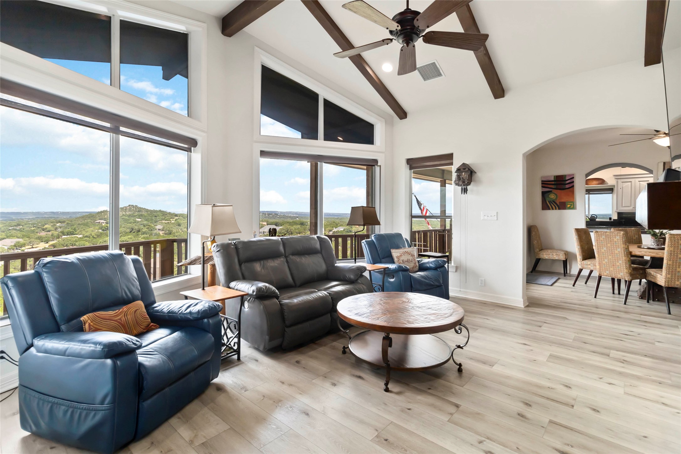 633 Flaman Road Canyon Lake, TX 78133 - Photo 7 of 40 a living room with furniture and a floor to ceiling window