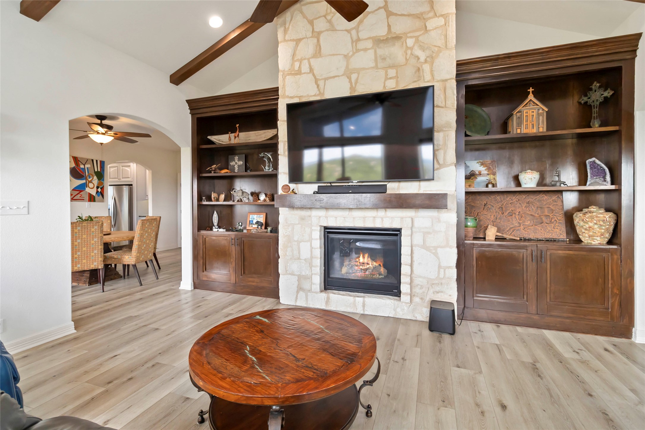 633 Flaman Road Canyon Lake, TX 78133 - Photo 8 of 40 a living room with furniture and a fireplace