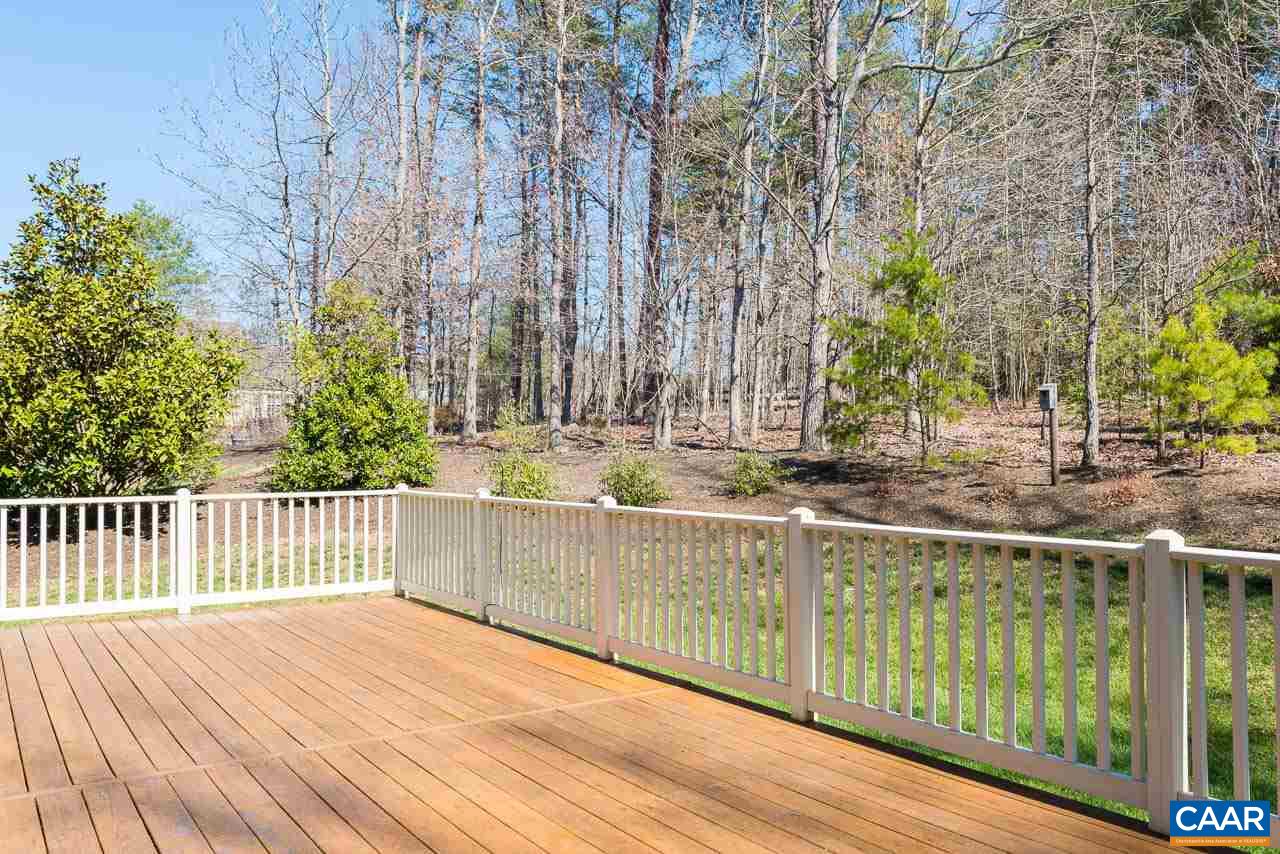 3392 Darby Road Keswick, VA 22947 - Photo 14 of 23 a view of a wooden deck and a yard