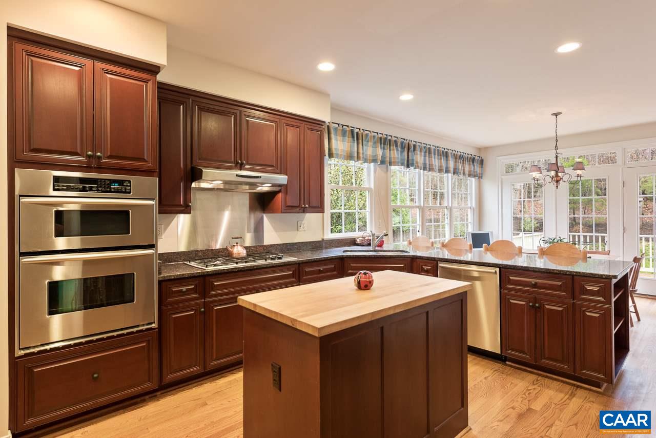 3392 Darby Road Keswick, VA 22947 - Photo 6 of 23 a kitchen with a stove sink and microwave