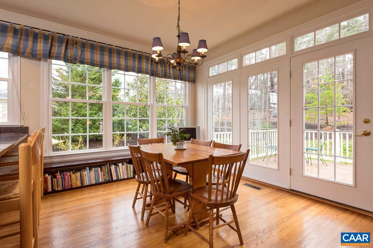 3392 Darby Road Keswick, VA 22947 - Photo 7 of 23 a view of a dining room with furniture window and wooden floor