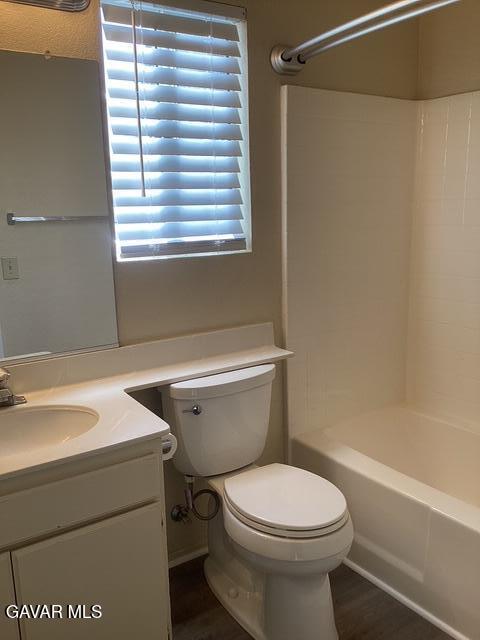 44603 Palm Lane Lancaster, CA 93535 - Photo 9 of 18 a bathroom with a sink a toilet and a bathtub