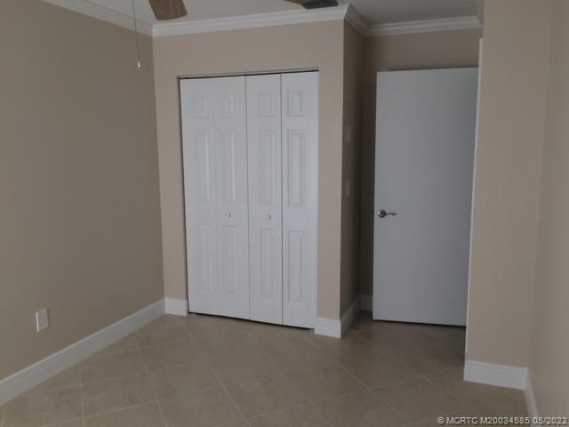 3994 Northwest Cinnamon Tree Circle Jensen Beach, FL 34957 - Photo 6 of 14 a view of an empty room