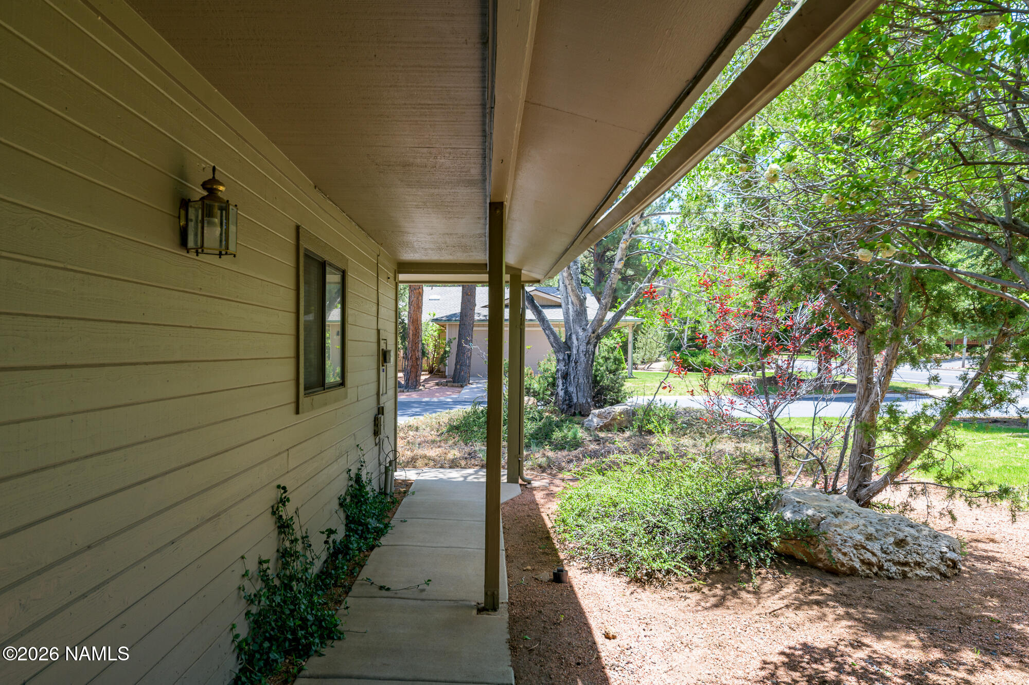 6000 East Laurel Loop, Unit 11 Flagstaff, AZ 86004 - Photo 10 of 54 a view of a pathway of a house