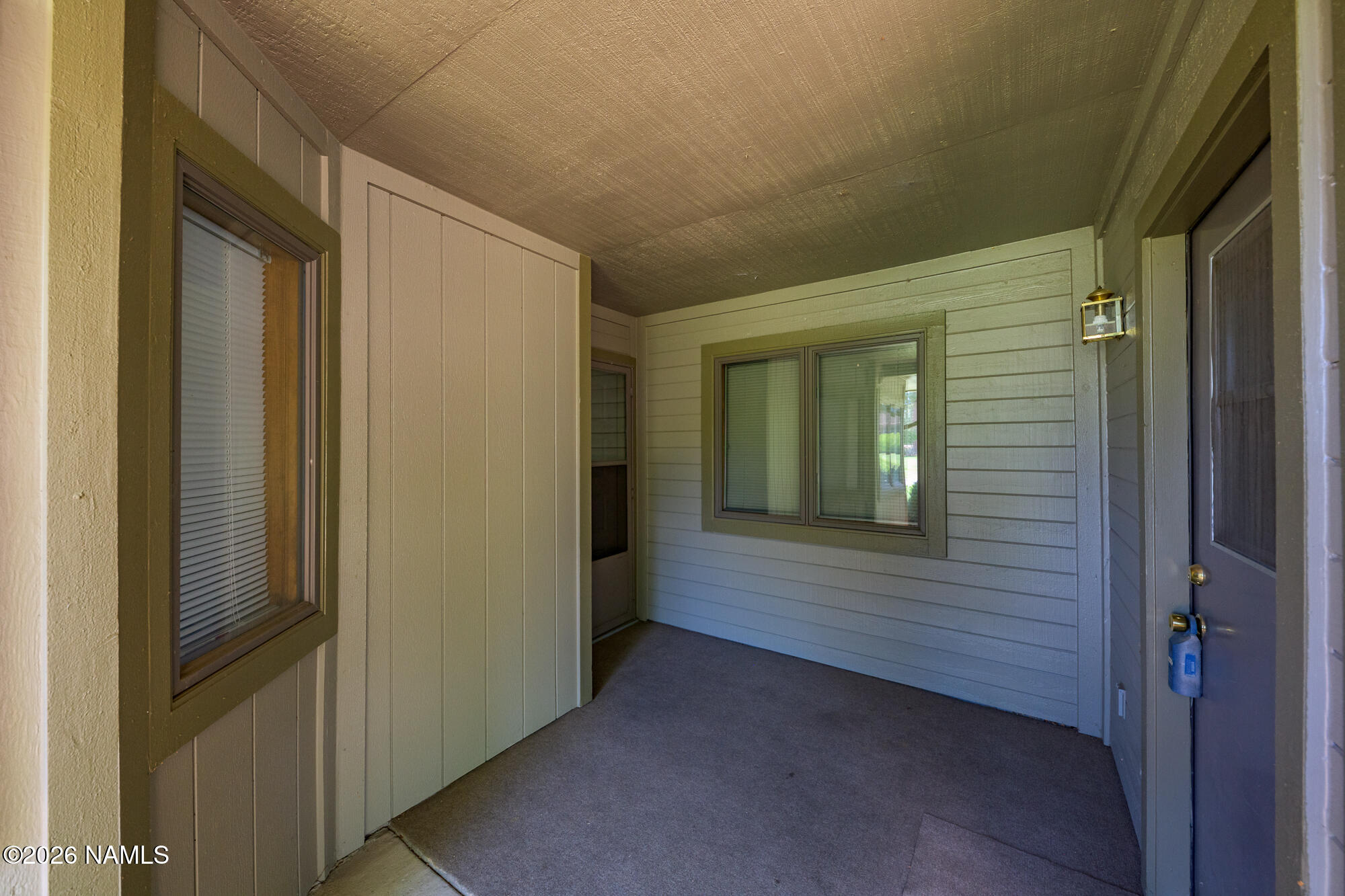 6000 East Laurel Loop, Unit 11 Flagstaff, AZ 86004 - Photo 11 of 54 a view of front door of a house