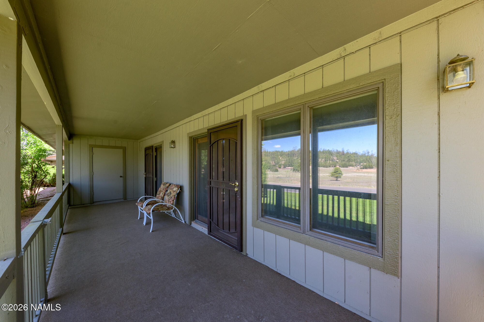 6000 East Laurel Loop, Unit 11 Flagstaff, AZ 86004 - Photo 15 of 54 a view of a porch with furniture