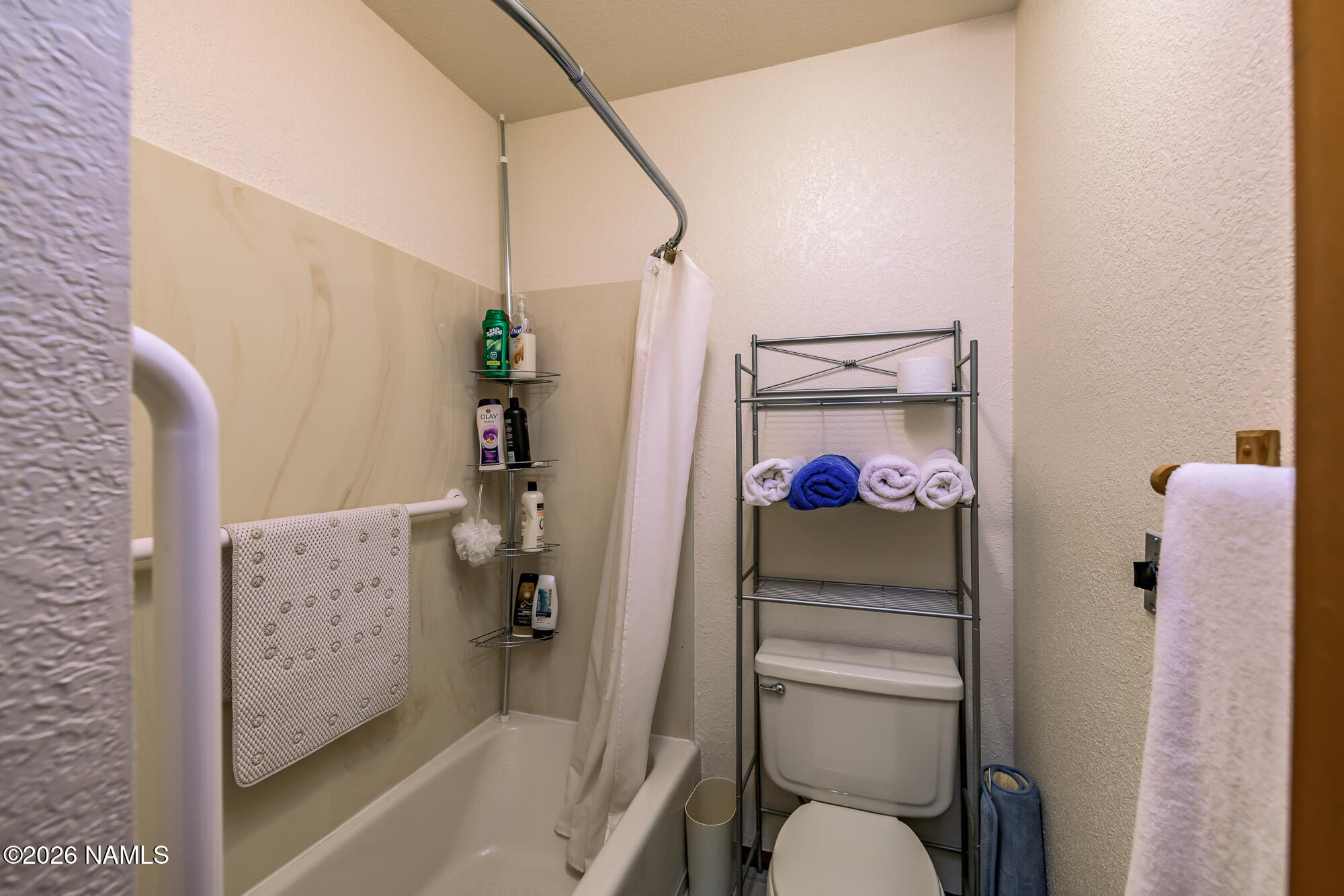 6000 East Laurel Loop, Unit 11 Flagstaff, AZ 86004 - Photo 32 of 54 a bathroom with a shower